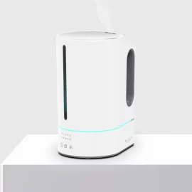 MIST 8 easy-fill ultrasonic humidifier on a white platform